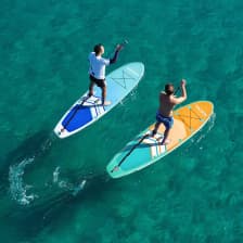 Two persons on stand up paddle boards