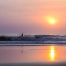 Surf at sunset in Playa Avellanas